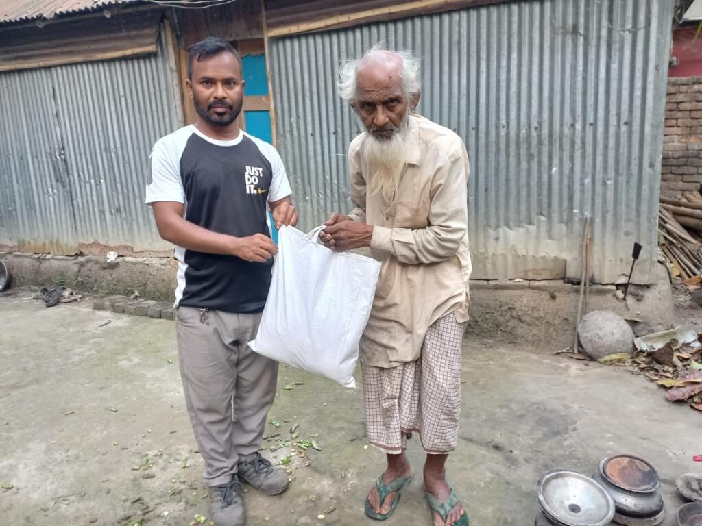 Clothes and Foods Distribution Program for Eid (Part # 10)